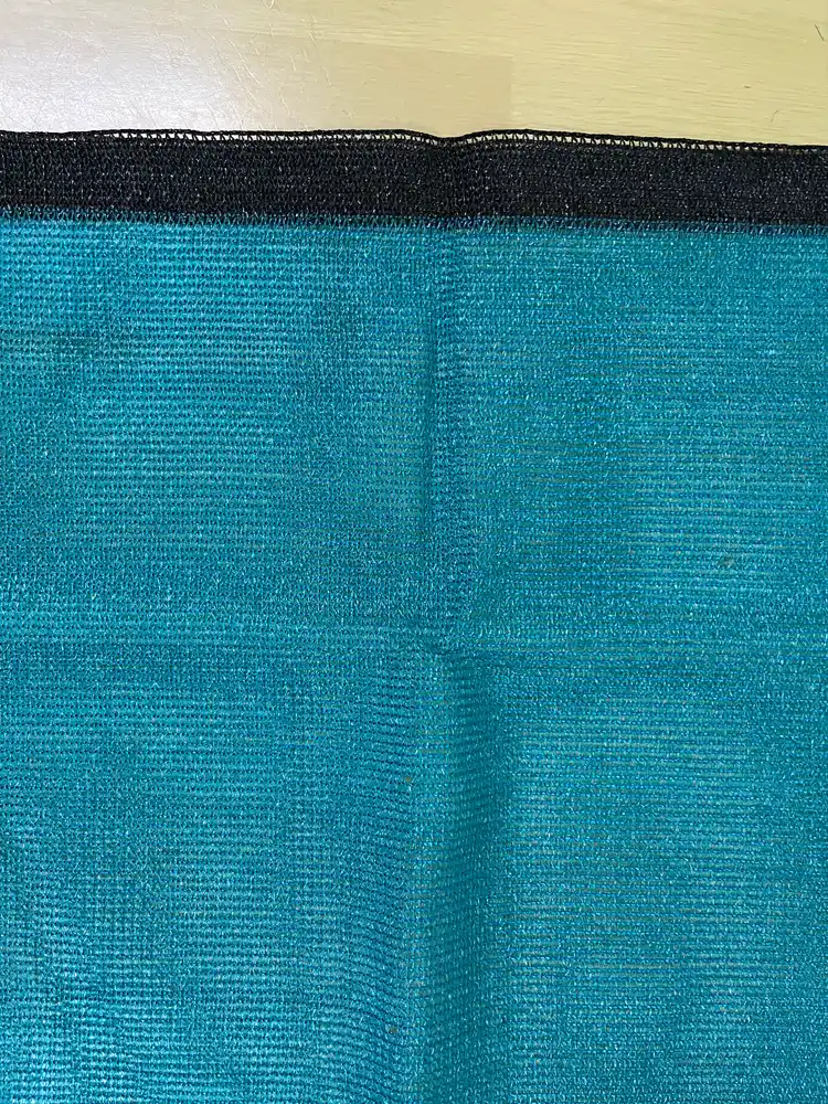 Tape shade net, evergreen with black border, 110 GSM, 75% shade